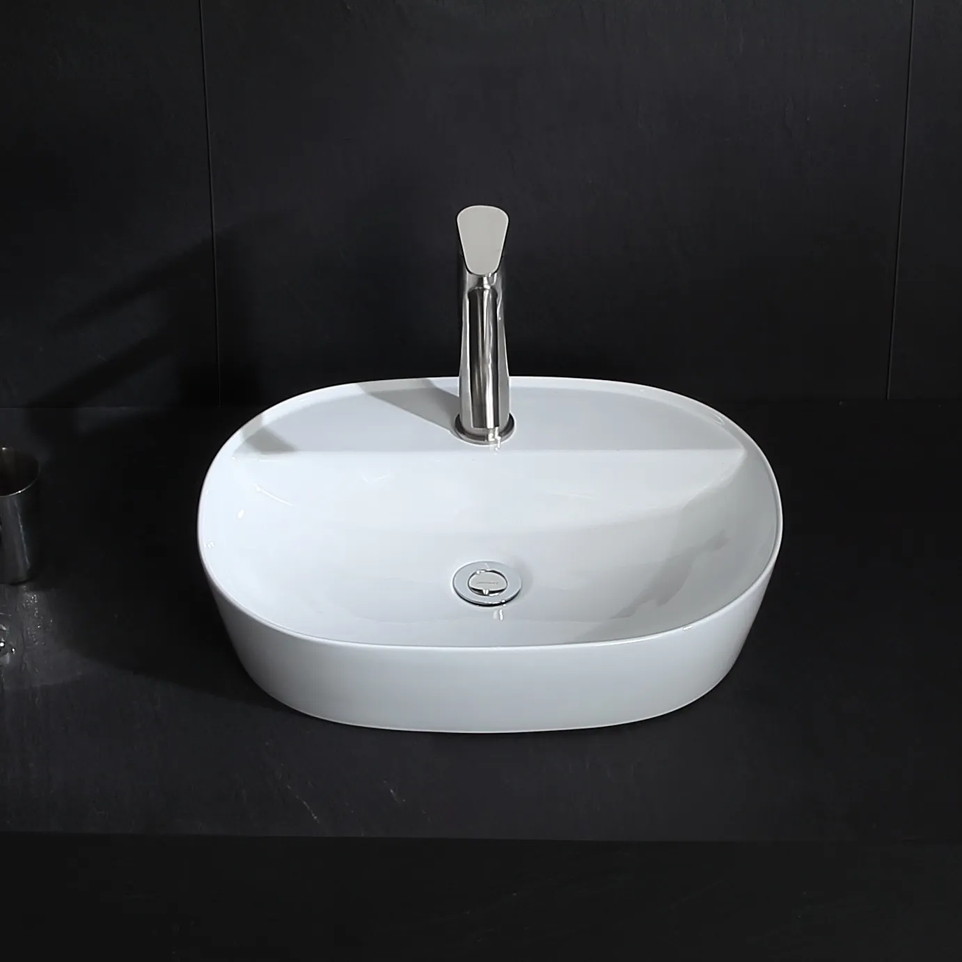 ceramic-vanity-sinks-wholesale-oval-wash-basin-for-hotel-projects-1